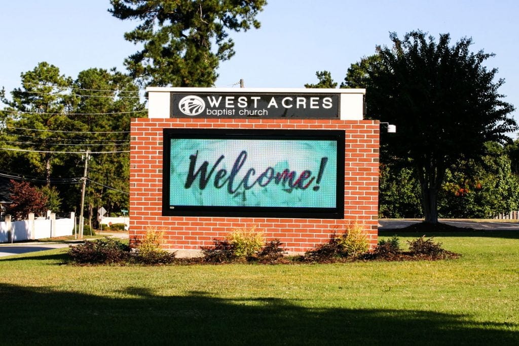 a welcome signage outside of a baptist church
