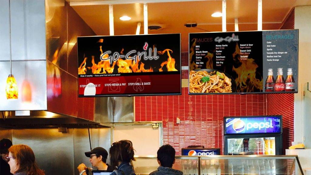 Digital menu boards for Go-Grill, a food court restaurant, design by Kuusoft and operating on NexSigns